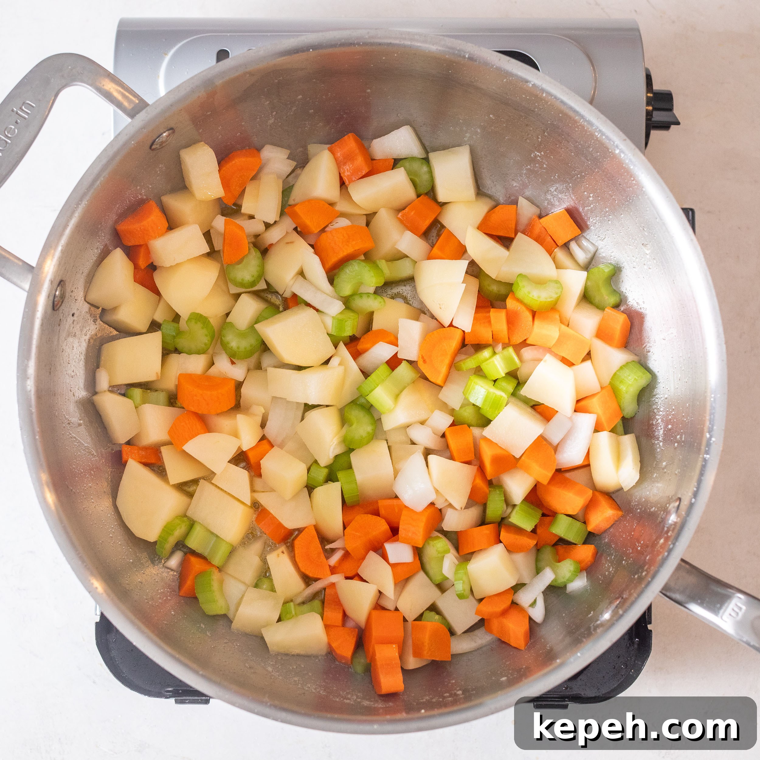 Leftover Turkey Pot Pie Recipe for Comforting Family Meals 3 Vegetables in pan