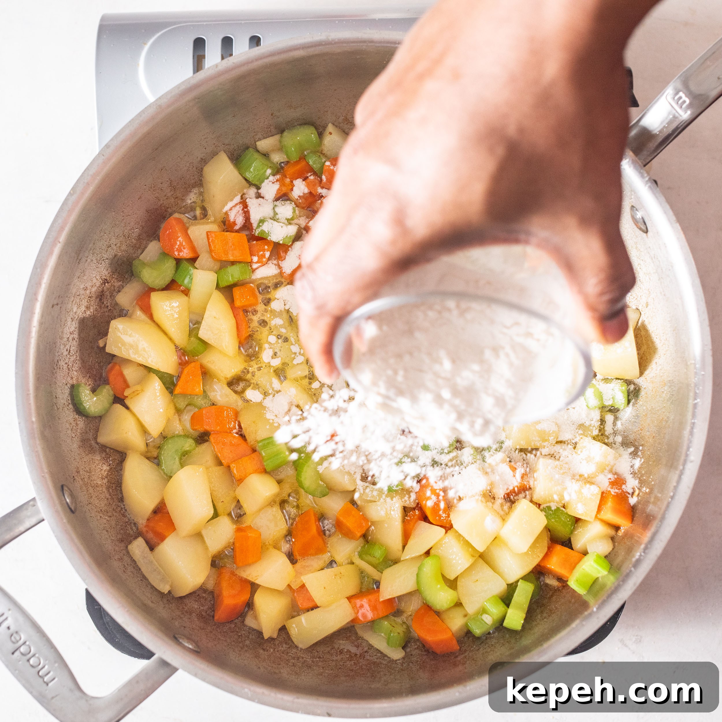 Leftover Turkey Pot Pie Recipe for Comforting Family Meals 4 Flour added to vegetables