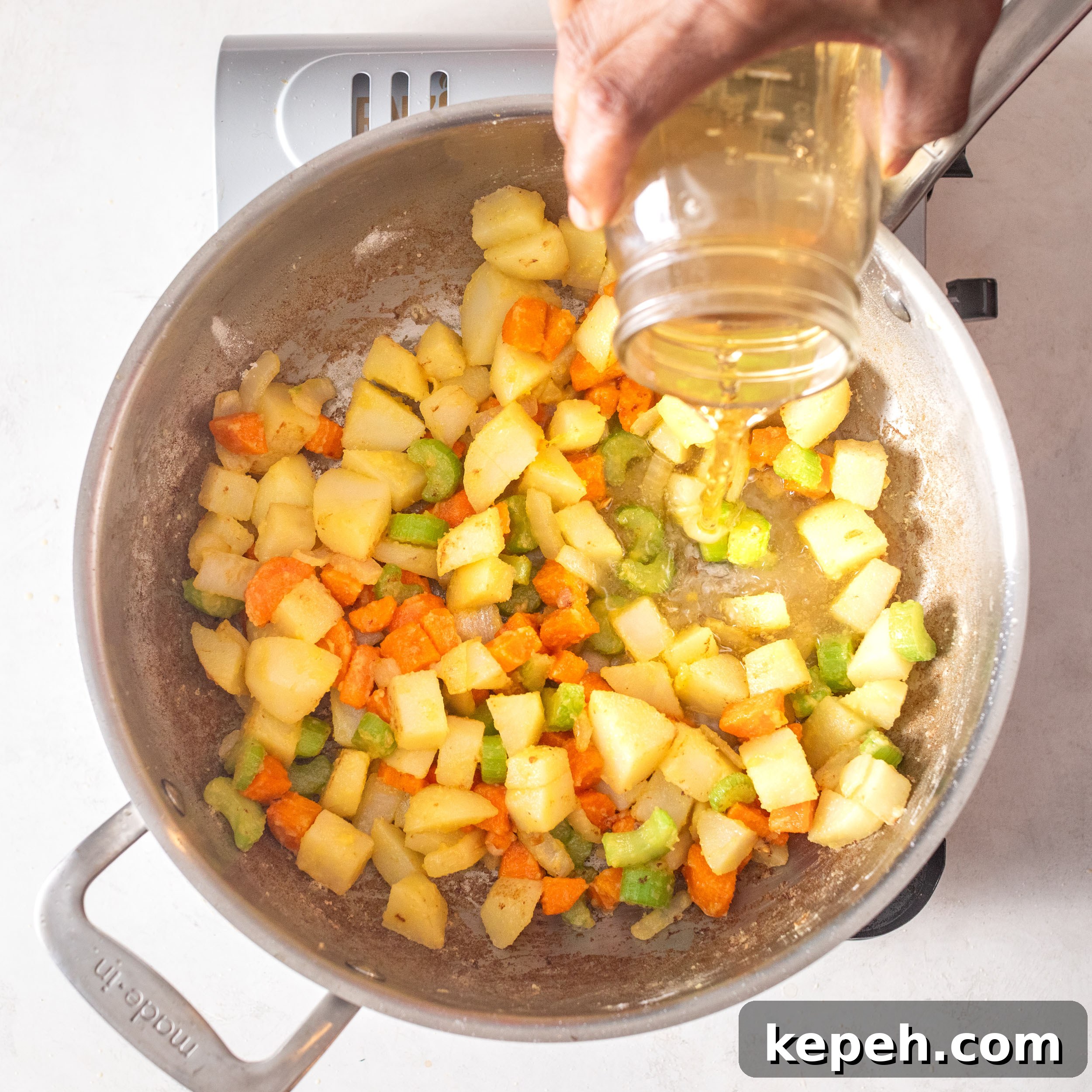 Leftover Turkey Pot Pie Recipe for Comforting Family Meals 5 Adding stock