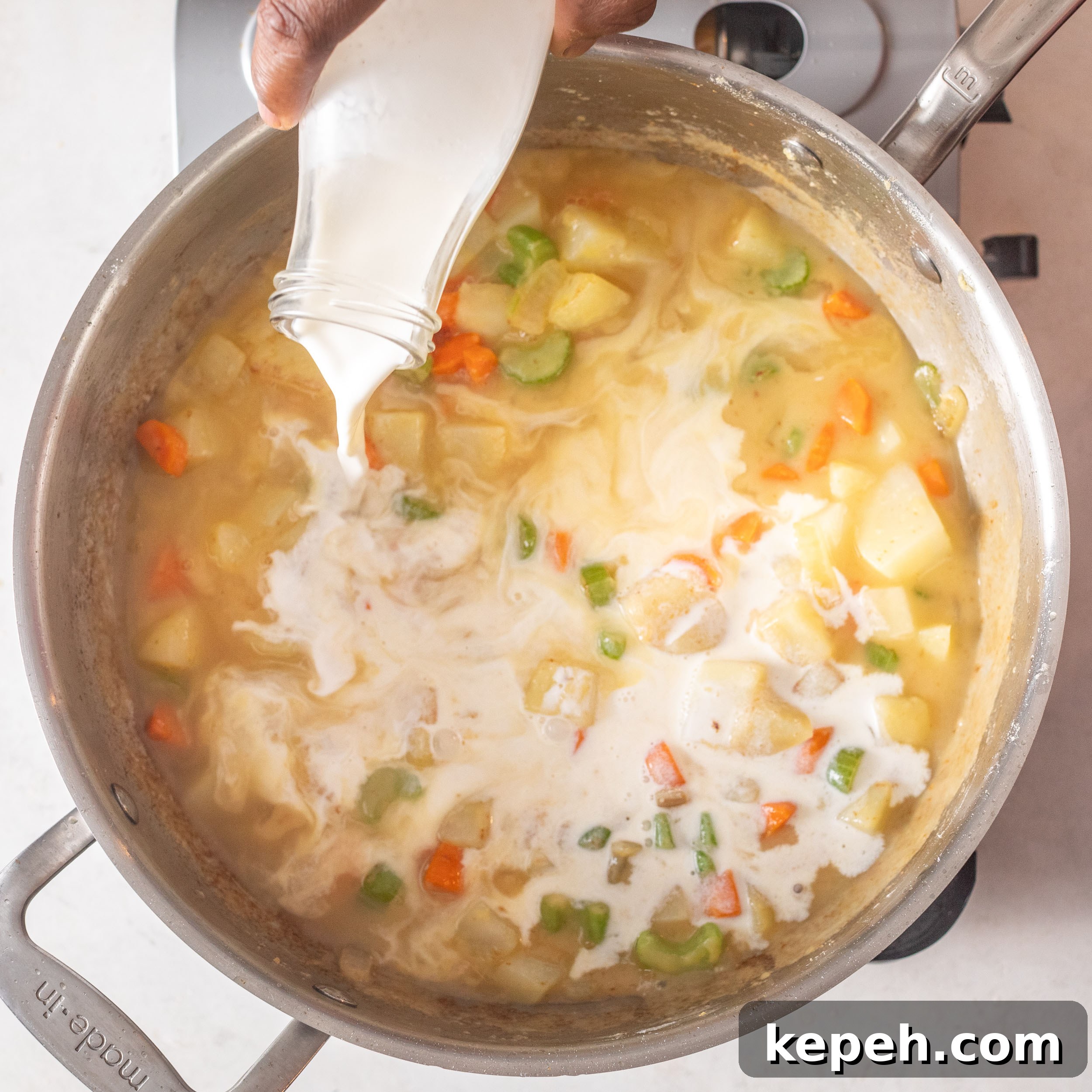 Leftover Turkey Pot Pie Recipe for Comforting Family Meals 6 Adding half and half