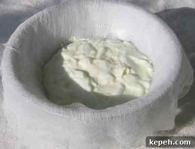 How to Strain Yogurt for Thick Greek-Style Yogurt 4 Put yogurt in cheesecloth to drain for greek recipes.