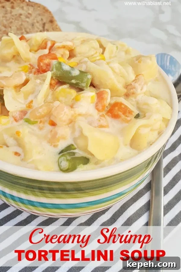 Creamy Shrimp Tortellini Soup is packed with vegetables, so filling and so comforting - ready in about 30 minutes Creamy Shrimp Tortellini Soup