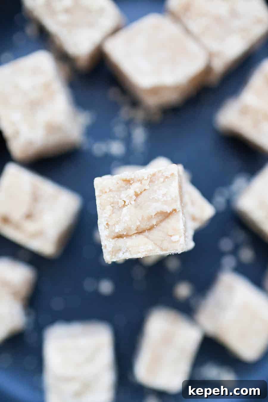 Decadent Peanut Butter Fudge Recipe You'll Love 5 peanut butter butter fudge on a black plate