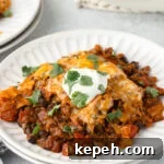 Enchilada skillet on a white plate.