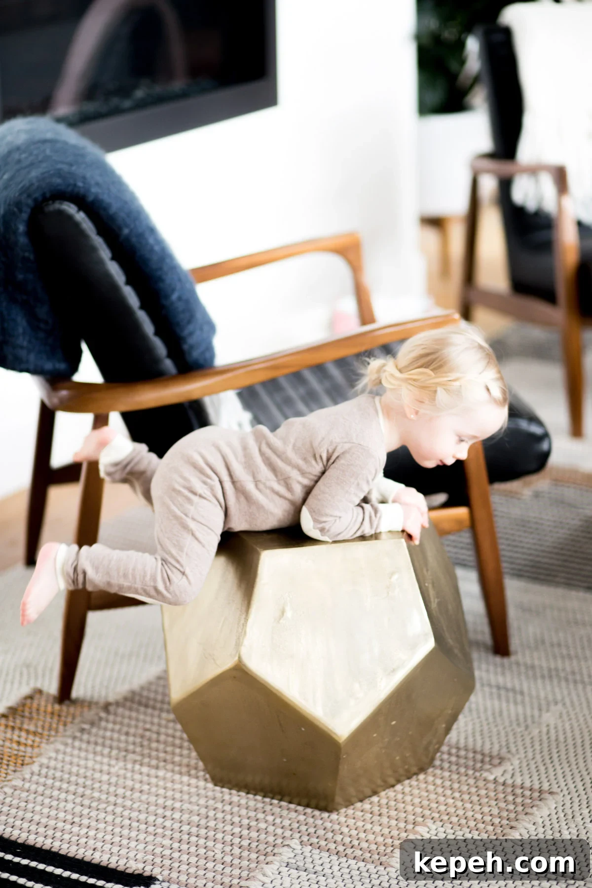 small girl climbing on a table modern furniture simple daily schedule for young kids printable