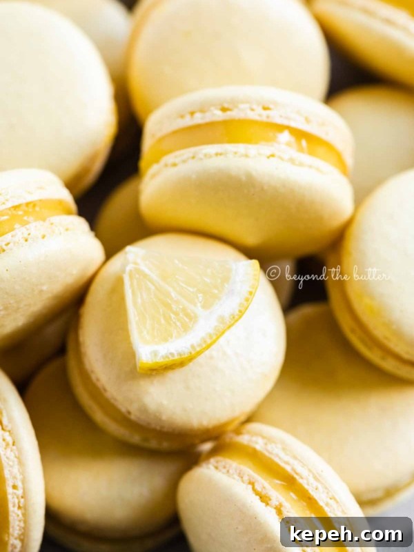Robin's Egg Macarons: Delicate Blue Pastry Recipe and Tips 15 Close up of lemon bar macarons randomly placed.