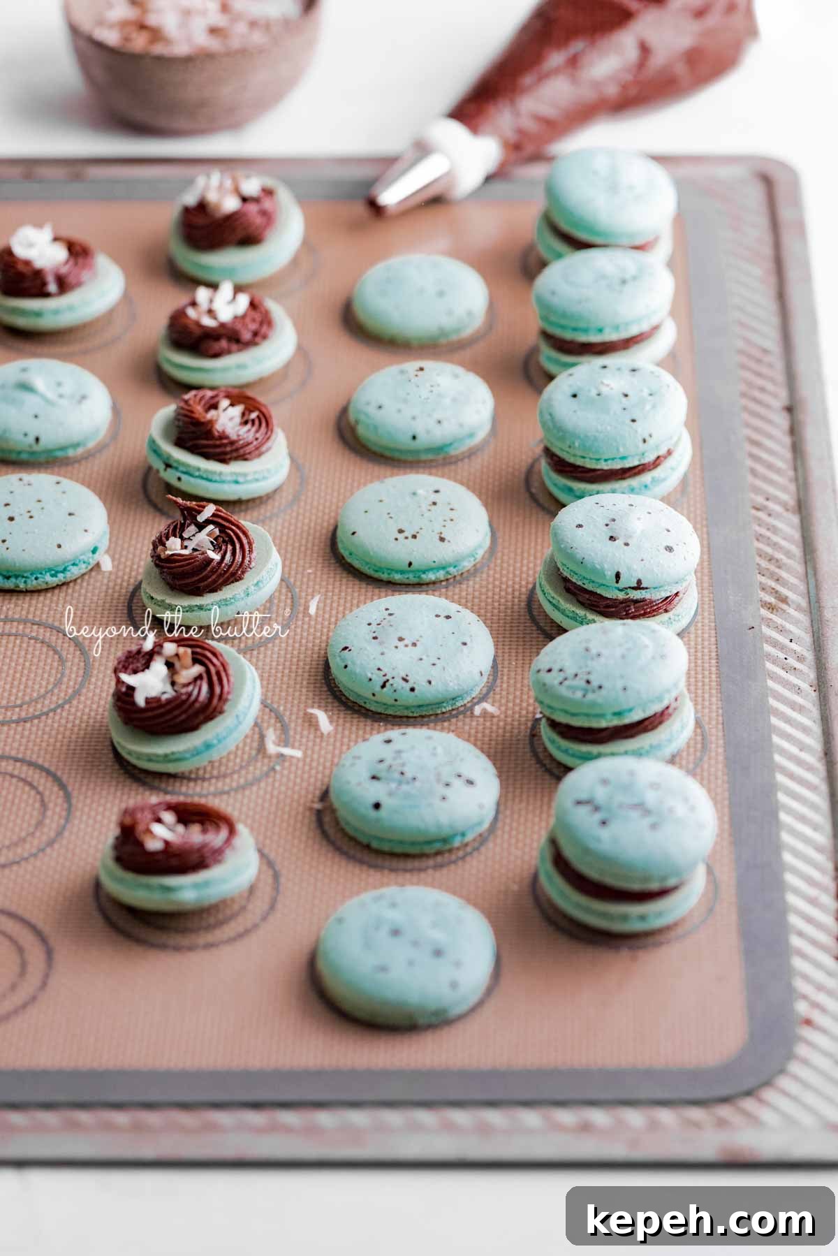Robin's Egg Macarons: Delicate Blue Pastry Recipe and Tips 7 Assembling the robin's egg macarons on a silicone baking mat