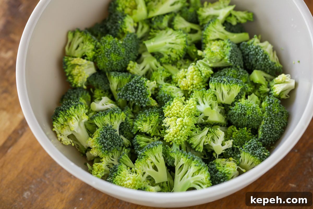 Classic Chicken Divan Casserole Recipe for Family Dinners 3 Chopped broccoli in bowl.