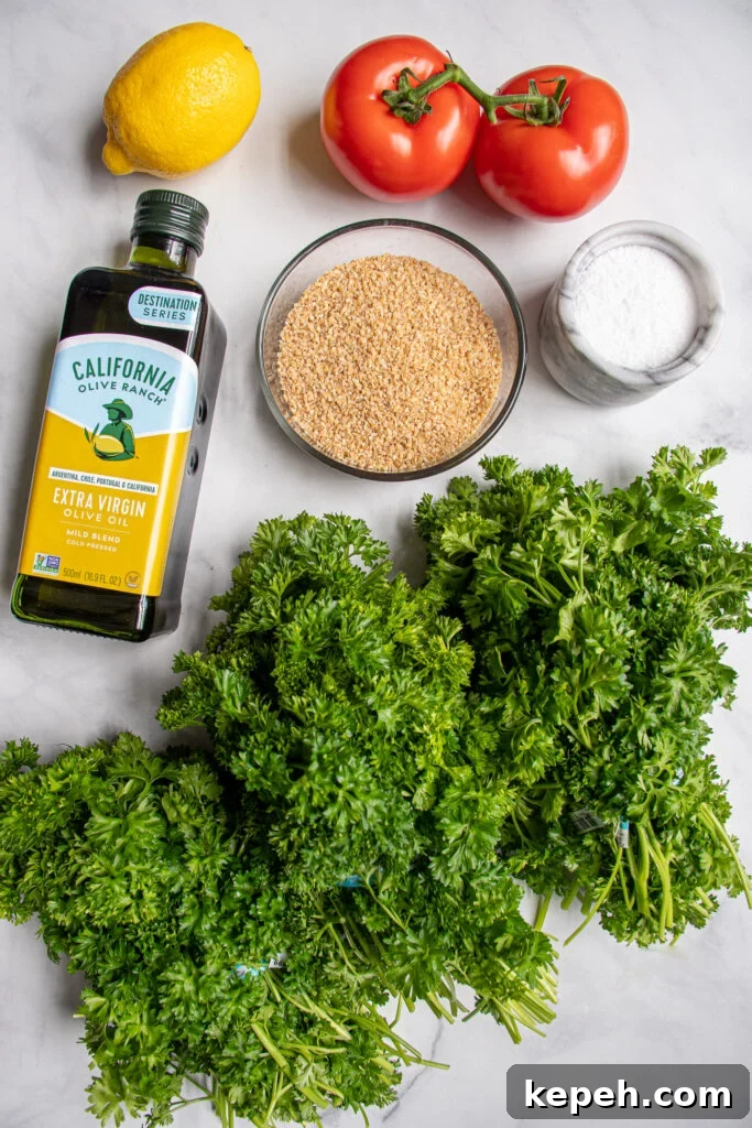 Ingredients needed to make basic tabbouleh salad laid out on a table top.