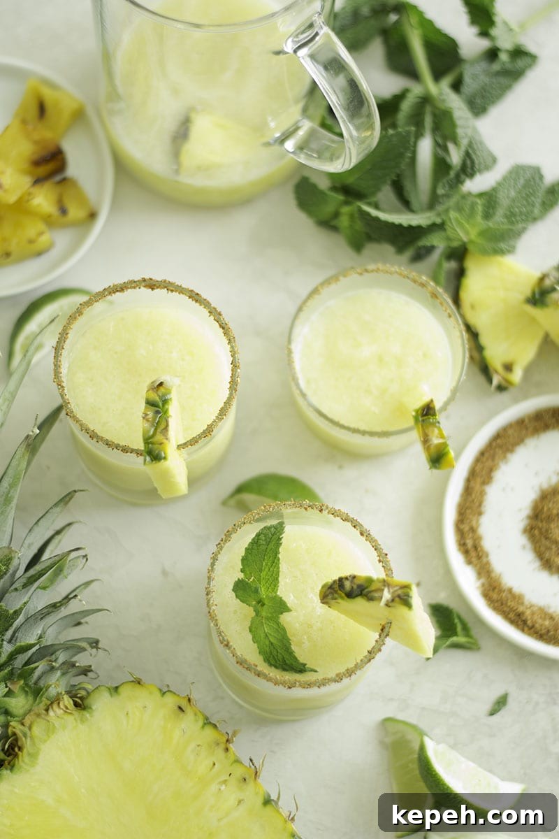 Charred Pineapple Frozen Margaritas Recipe for Summer Cocktails 4 Charred Pineapple Frozen Margaritas - Sarcastic Cooking