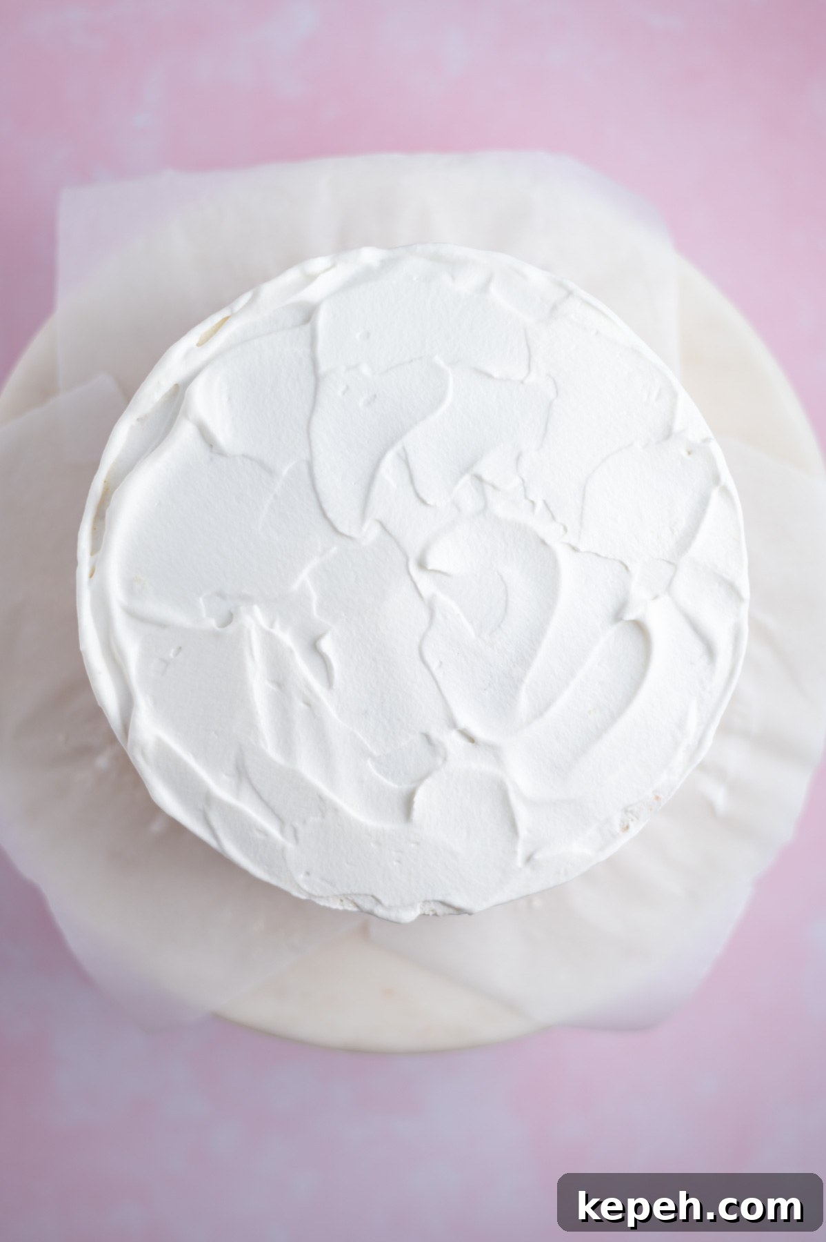 Light and Fluffy White Forest Cake Recipe 17 whipped cream frosting on top of the cake