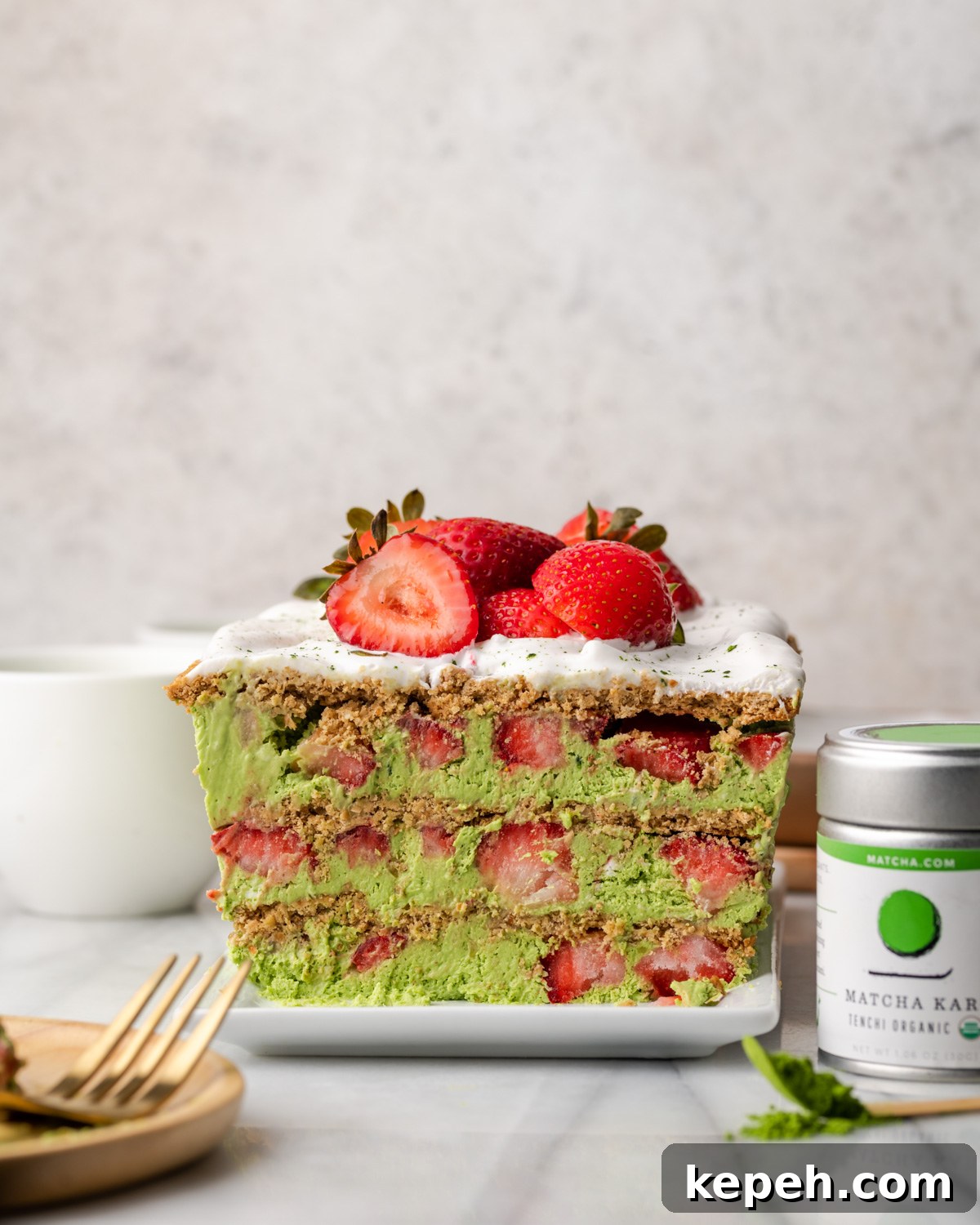 No-Bake Strawberry Matcha Cake — Gluten-Free Vegan Recipe 2 Side view of matcha cake layers.