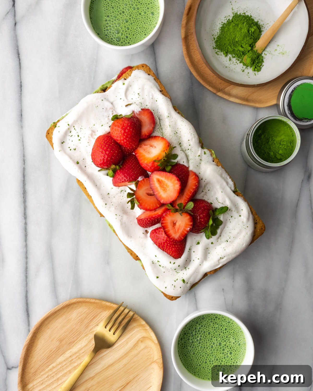 No-Bake Strawberry Matcha Cake — Gluten-Free Vegan Recipe 3 Overhead view of strawberry matcha cake on a marble table.
