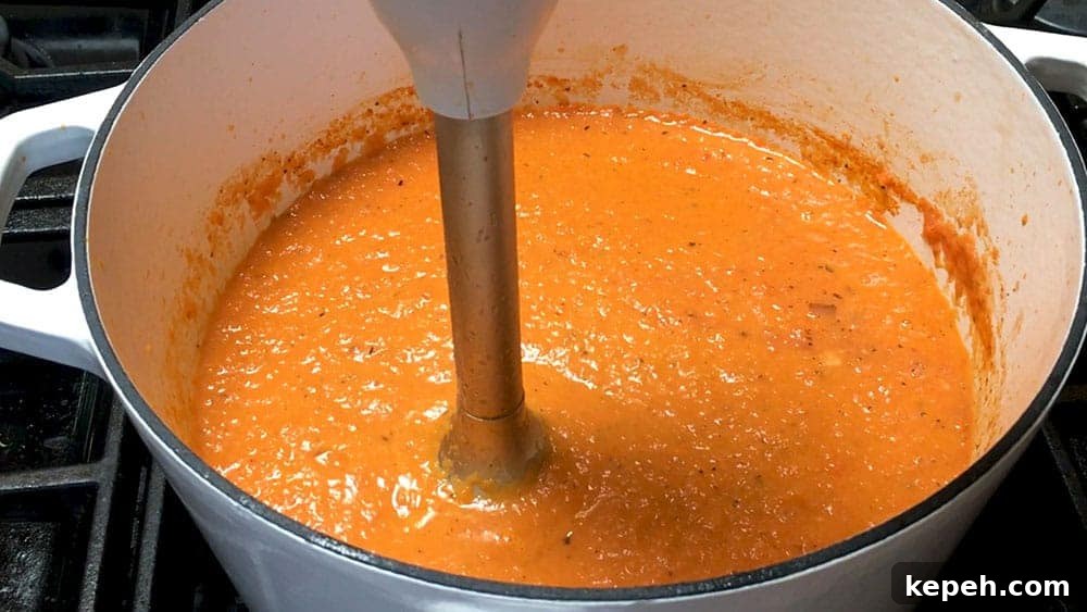 Creamy Tomato Bisque Recipe with Fresh Basil and Croutons 7 Blending Tomato Bisque until smooth