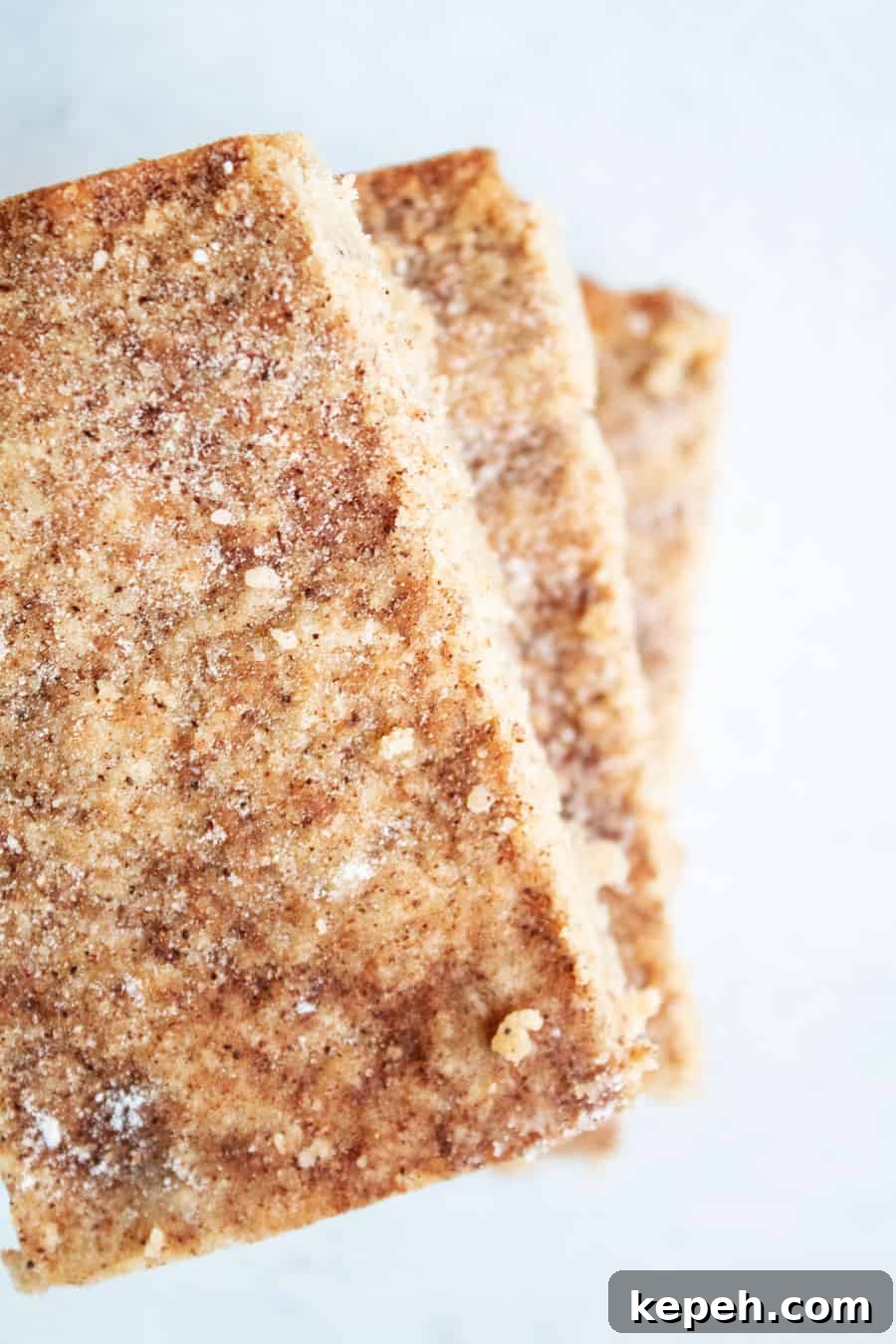 Keto Snickerdoodle Cookies: Low-Carb Cinnamon Treats 2 overhead view of three stacked keto snickerdoodles bars