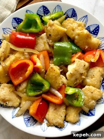 overhead shot of plate of black pepper fish