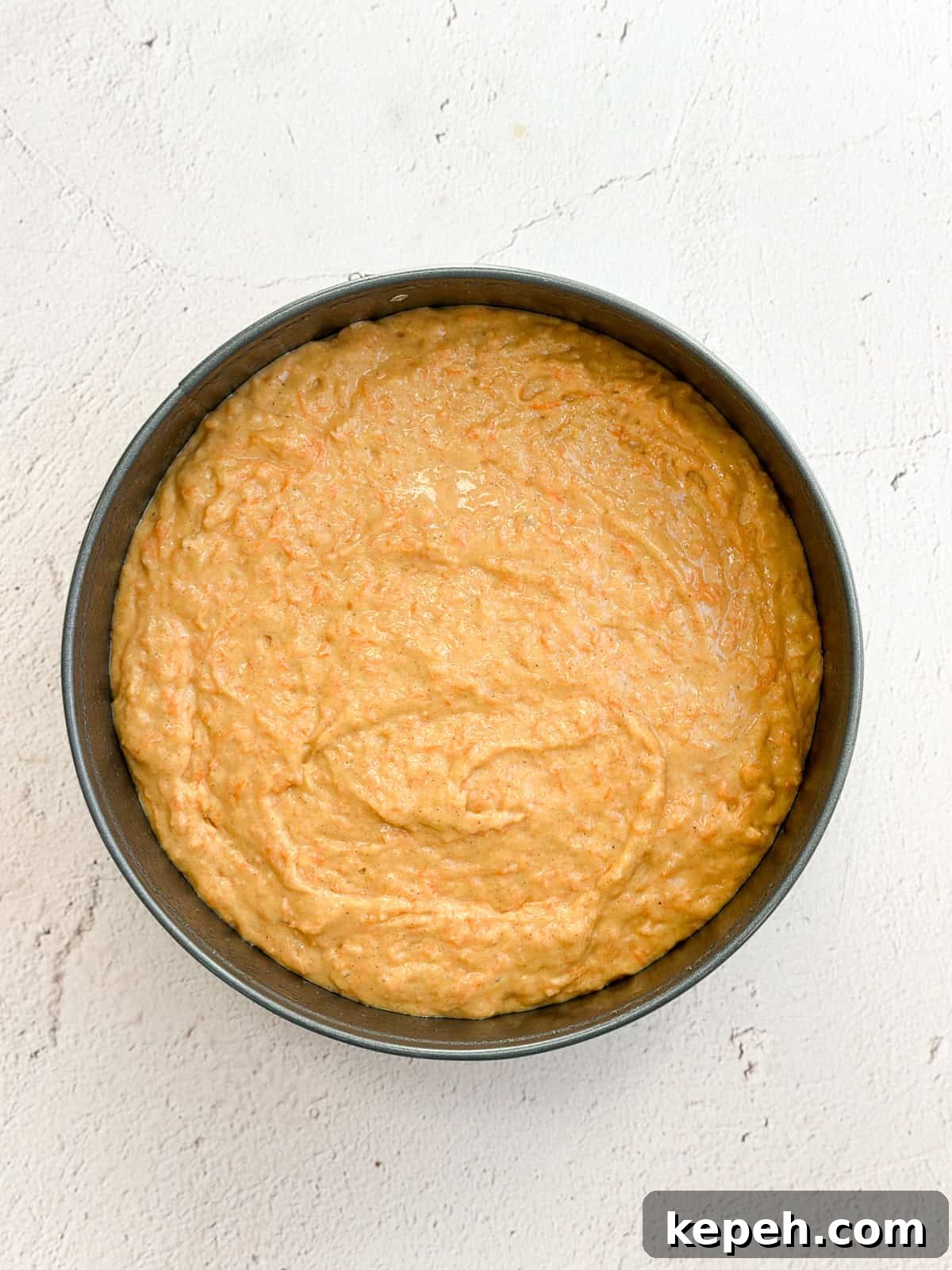 Moist Carrot Coffee Cake with Cream Cheese Glaze 7 Carrot cake batter in the baking pan.