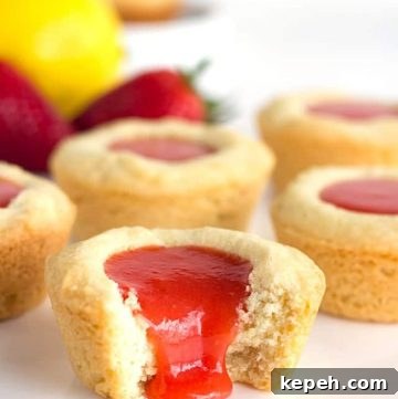 Strawberry Lemon Sugar Cookie Cups Recipe — Refreshing Dessert Cups 5 Strawberry Lemon Sugar Cookie Cups - tender sugar cookies baked in a cupcake tin. They're filled with a sweet and tangy strawberry lemon curd and make the perfect summertime cookie!