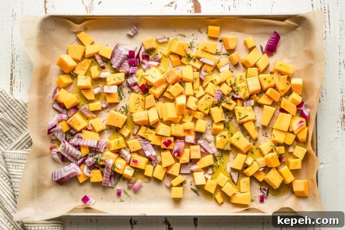 Roasted Butternut Squash Pasta with Sage and Parmesan 4 Baking sheet with squash, onion, and seasonings.