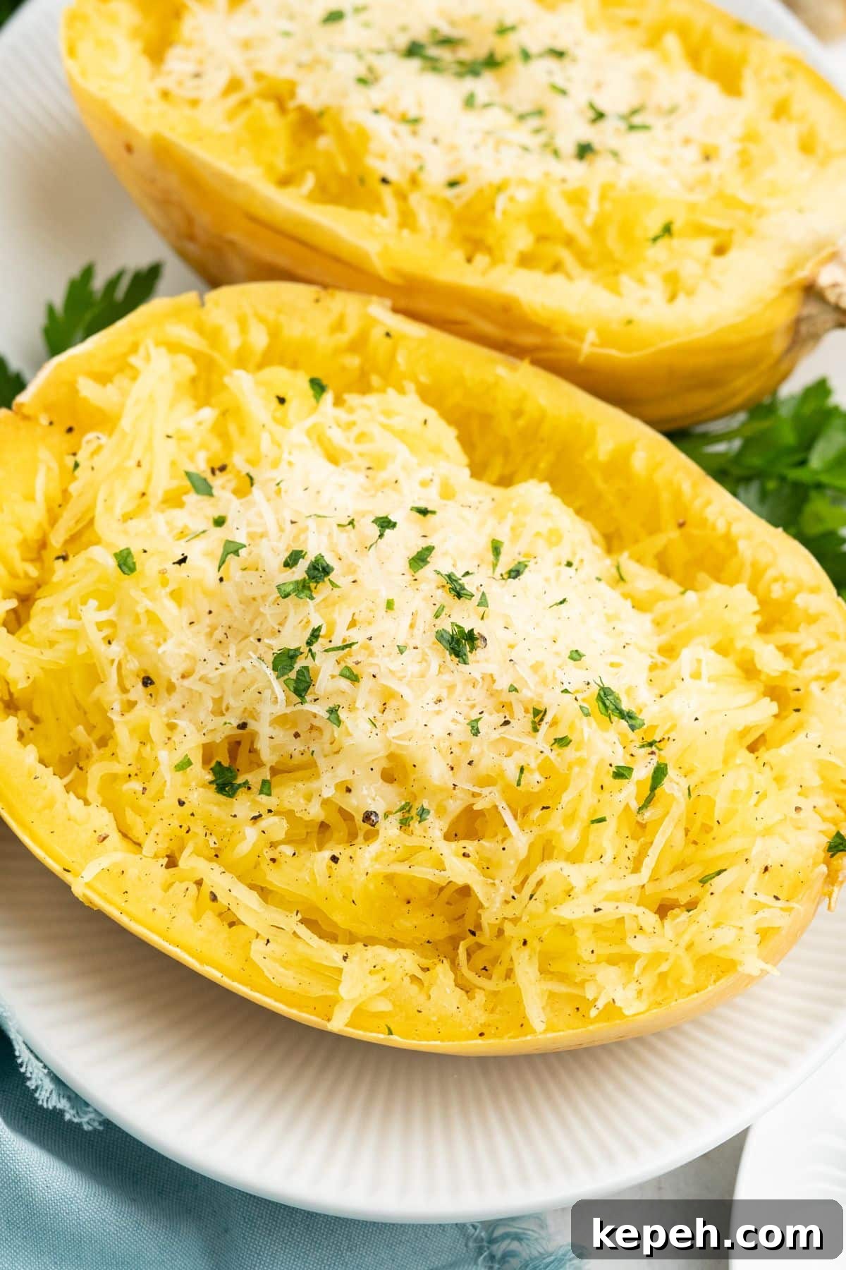 A close up of crockpot spaghetti squash on a plate.