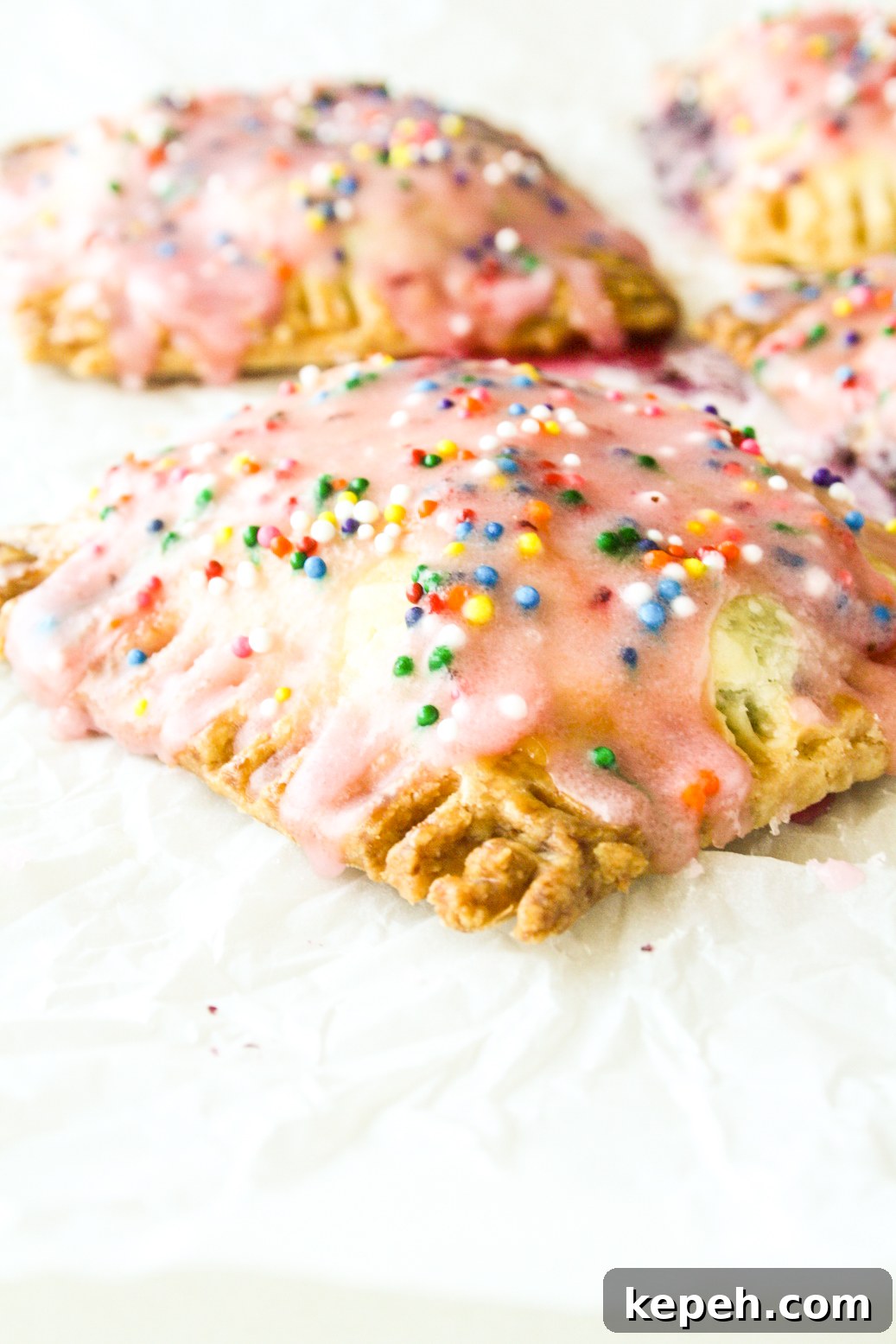 Eggless Blueberry Pop-Tarts with Zesty Lemon Glaze 3 Buttery, flaky pop tarts with blueberry filling and tangy lemon glaze