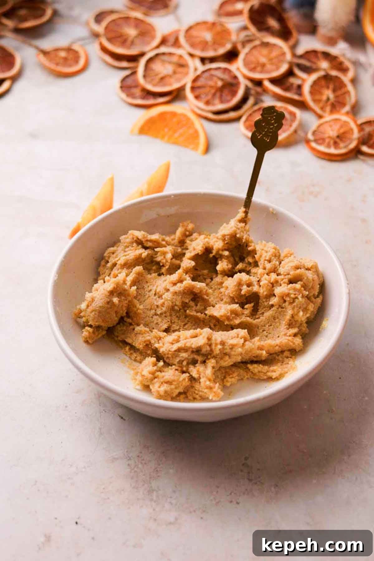 mixing orange vanilla filling for rolls