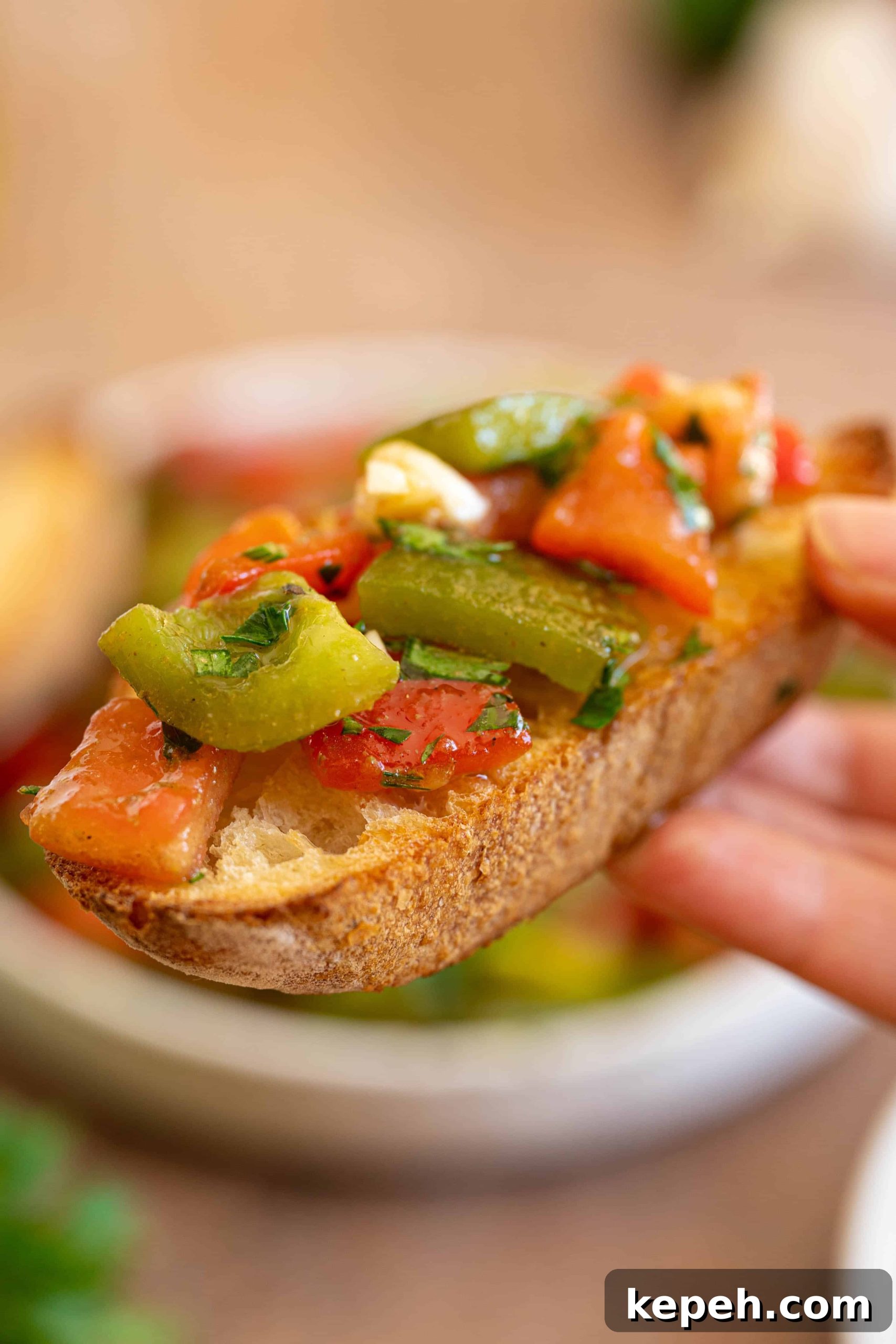Moroccan Roasted Pepper Salad Recipe with Garlic and Herbs 7 a piece of bread with pepper salad