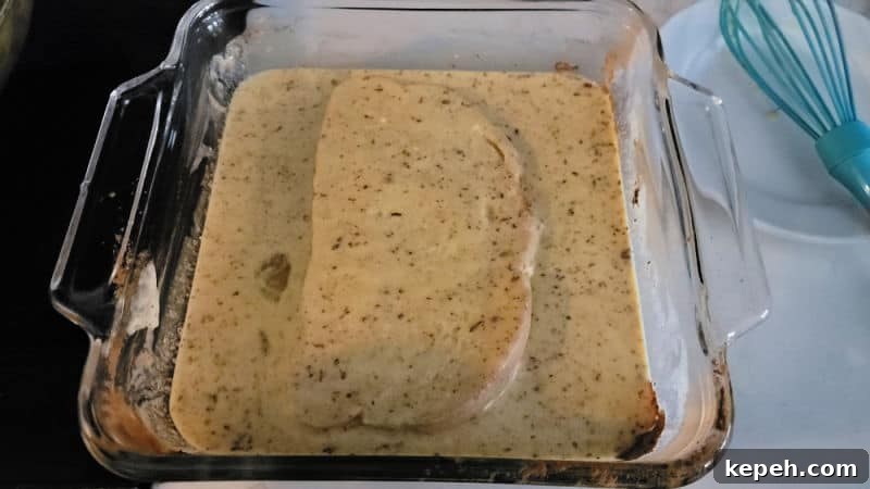 Eggnog French Toast Recipe with Video Tutorial 6 Eggnog French Toast soaking in the eggnog mixture