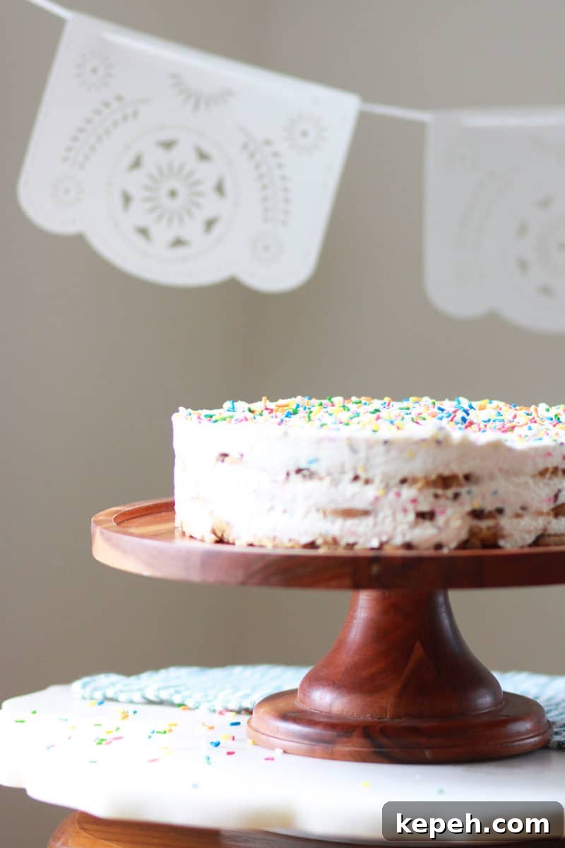 Gluten-Free Funfetti Icebox Cake Recipe for Celebrations 6 a funfetti ice box cake on a wooden cake stand
