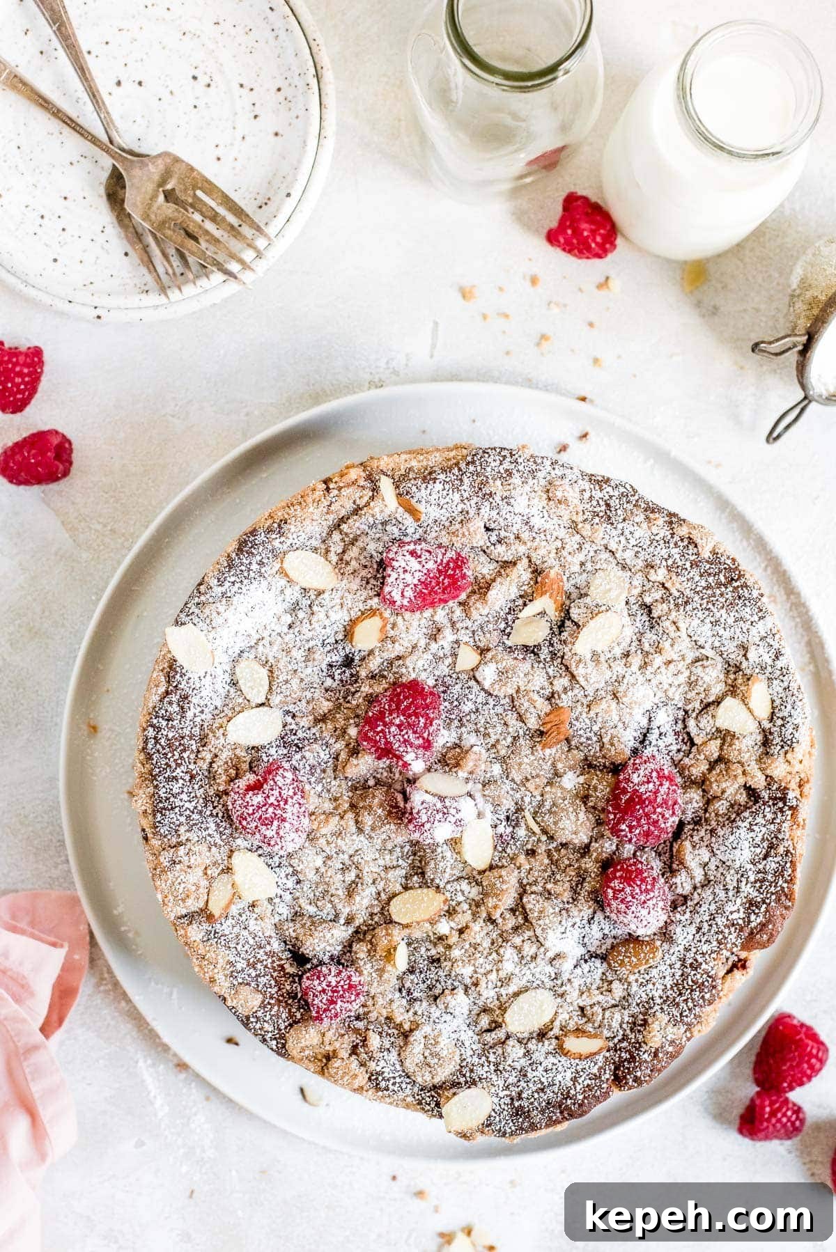 Raspberry Crumb Coffee Cake Recipe – Moist Summer Dessert 2 just baked coffee cake on serving plate