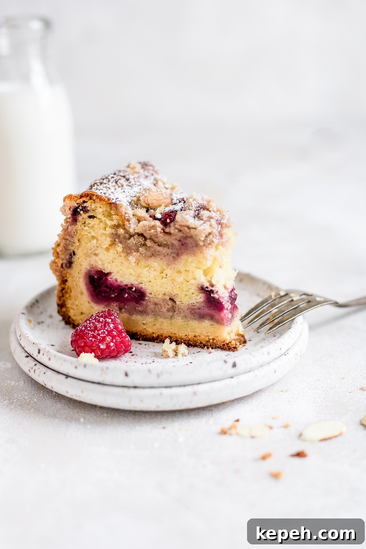 Raspberry Crumb Coffee Cake Recipe – Moist Summer Dessert 5 raspberry coffee cake on plate
