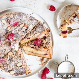 close up top of coffee cake being sliced