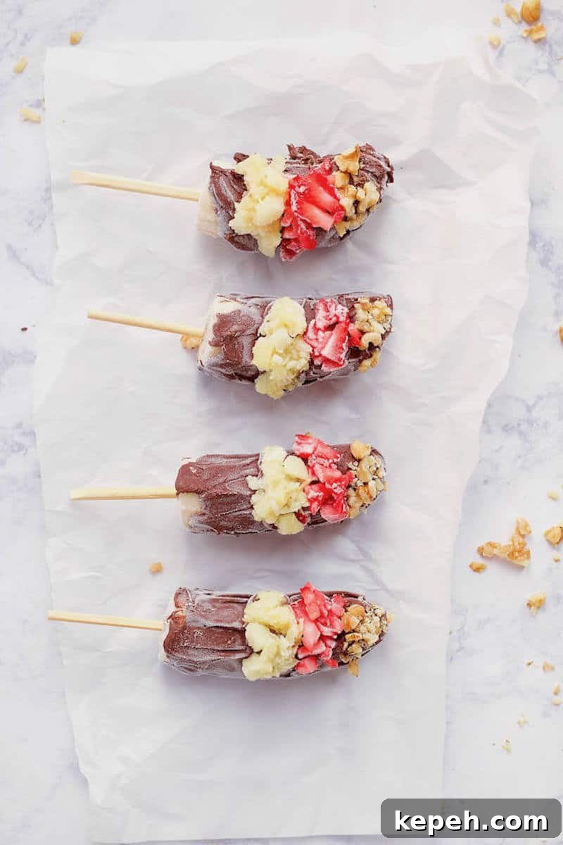 6-Ingredient Frozen Banana Split Popsicles for Summer Treats 3 Overhead tray of 6 Ingredient Frozen Banana Split Pops