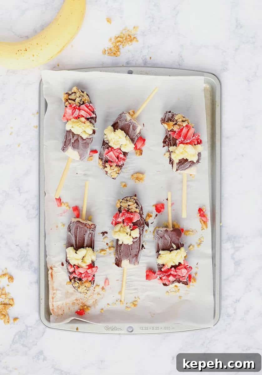 6-Ingredient Frozen Banana Split Popsicles for Summer Treats 4 Tray of 6 Ingredient Frozen Banana Split Pops Overhead
