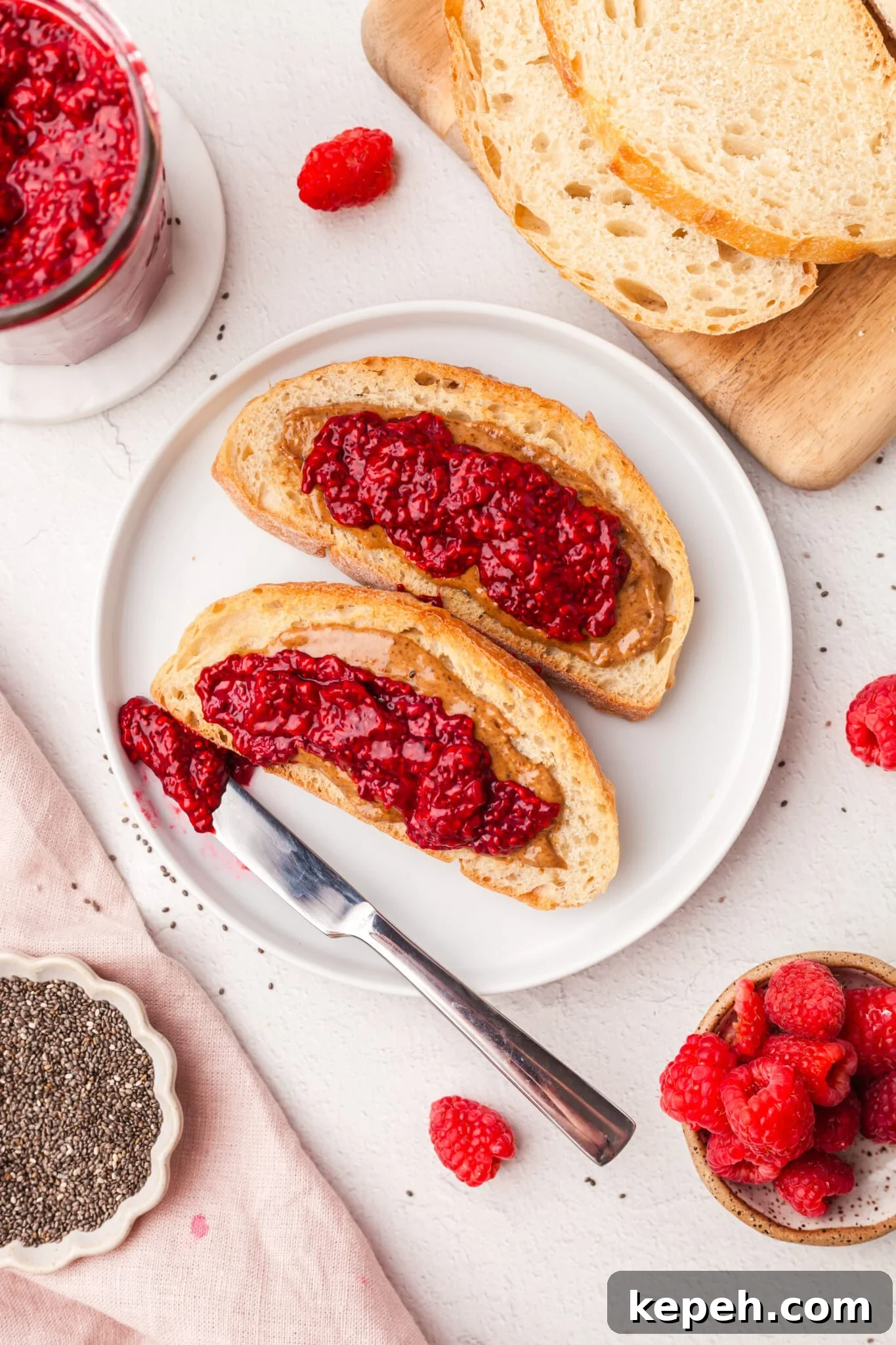 Raspberry Chia Seed Jam Recipe: Quick No-Cook Fruit Spread 7 Raspberry chia jam spread on toast.