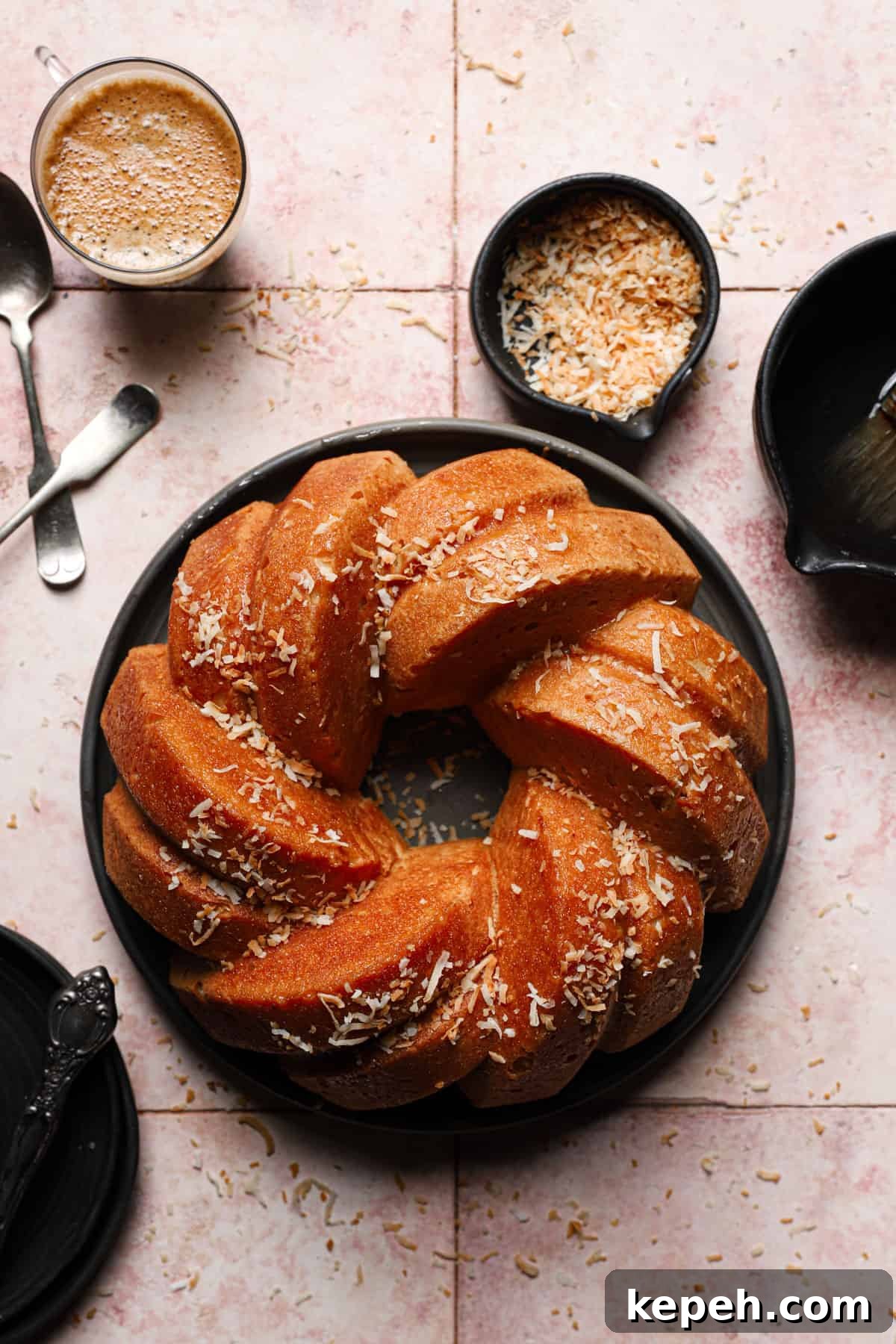 Perfect Pound Cake: Pro Tips for Moist, Classic Results 2 bundt pan in a plate sprinkled with shredded coconut