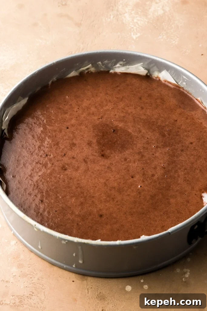 Decadent Chocolate Baklava Cake Recipe for Special Occasions 8 cake batter poured over the baklava