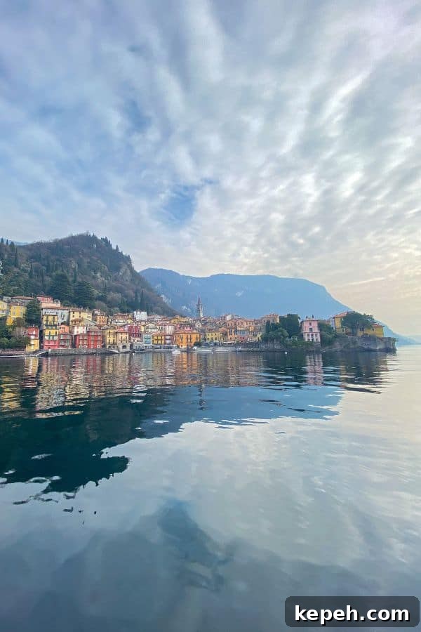 7 Charming Day Trips from Milan: Lakes, Villages & Castles 2 Lake Como view over the water, mountains and colorful houses, one of the best day trips from Milan