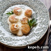 Pan-Seared Scallops in Creamy Gruyère Sauce 2 Pan-Seared Scallops with a Gruyère Cheese Sauce from The Little Kitchen thelittlekitchen.net