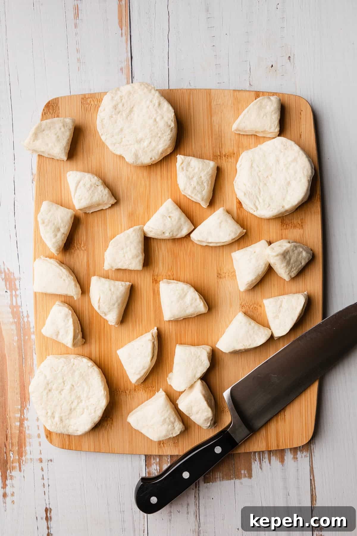 Crockpot Biscuits and Sausage Gravy Casserole 5 Cut up biscuits for the recipe.