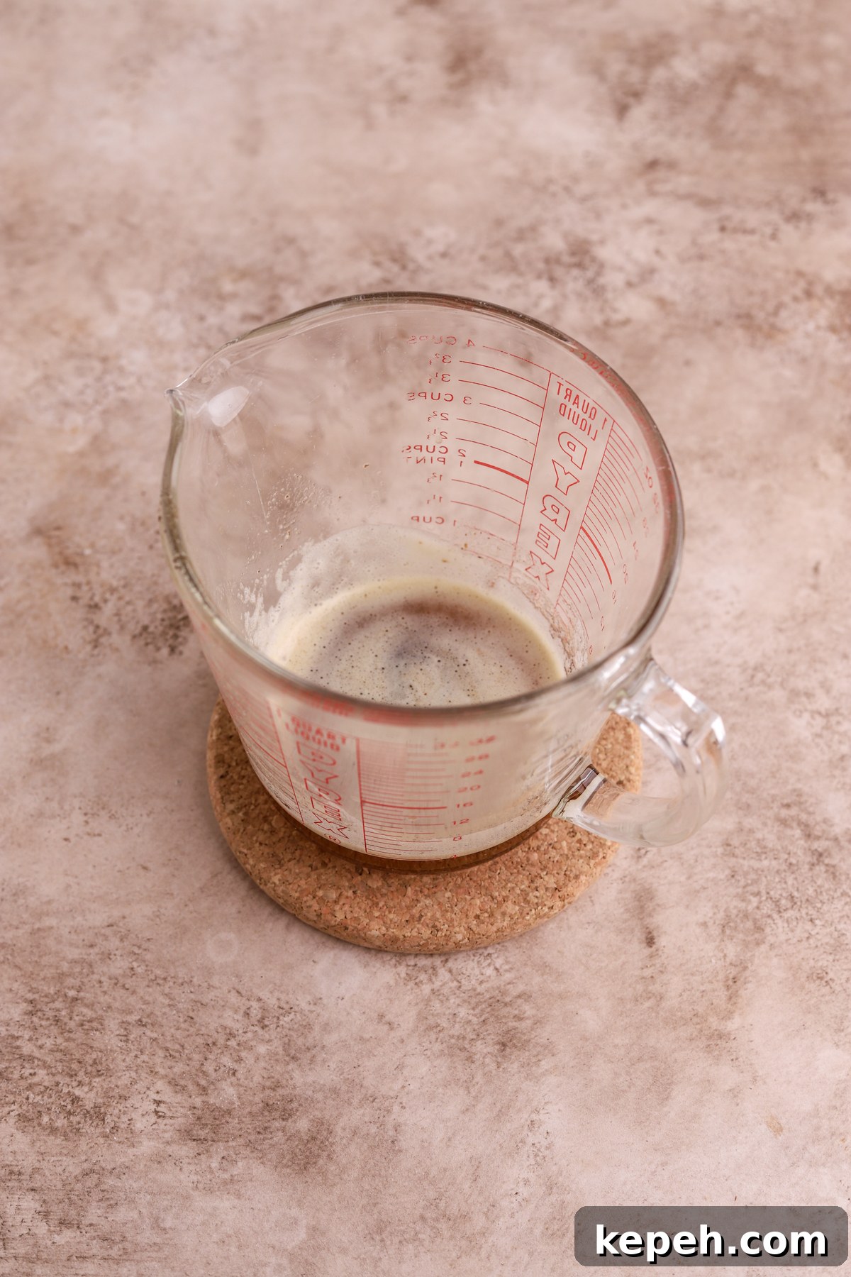 Brown butter in measuring cup
