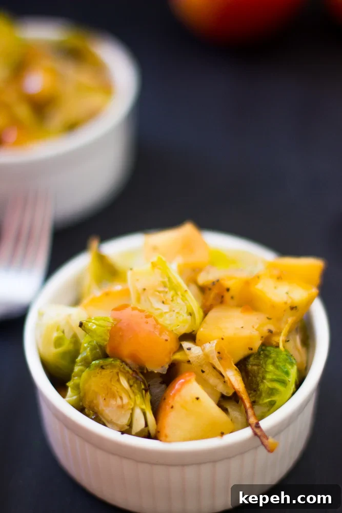 Roasted brussels sprouts in a white ramekin. 