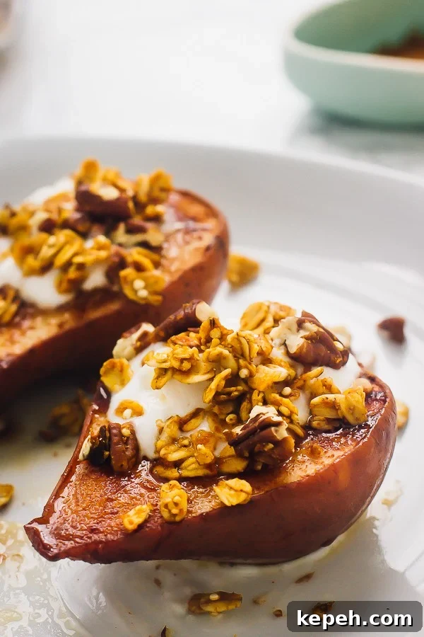 Two cinnamon baked pears on a white plate. 