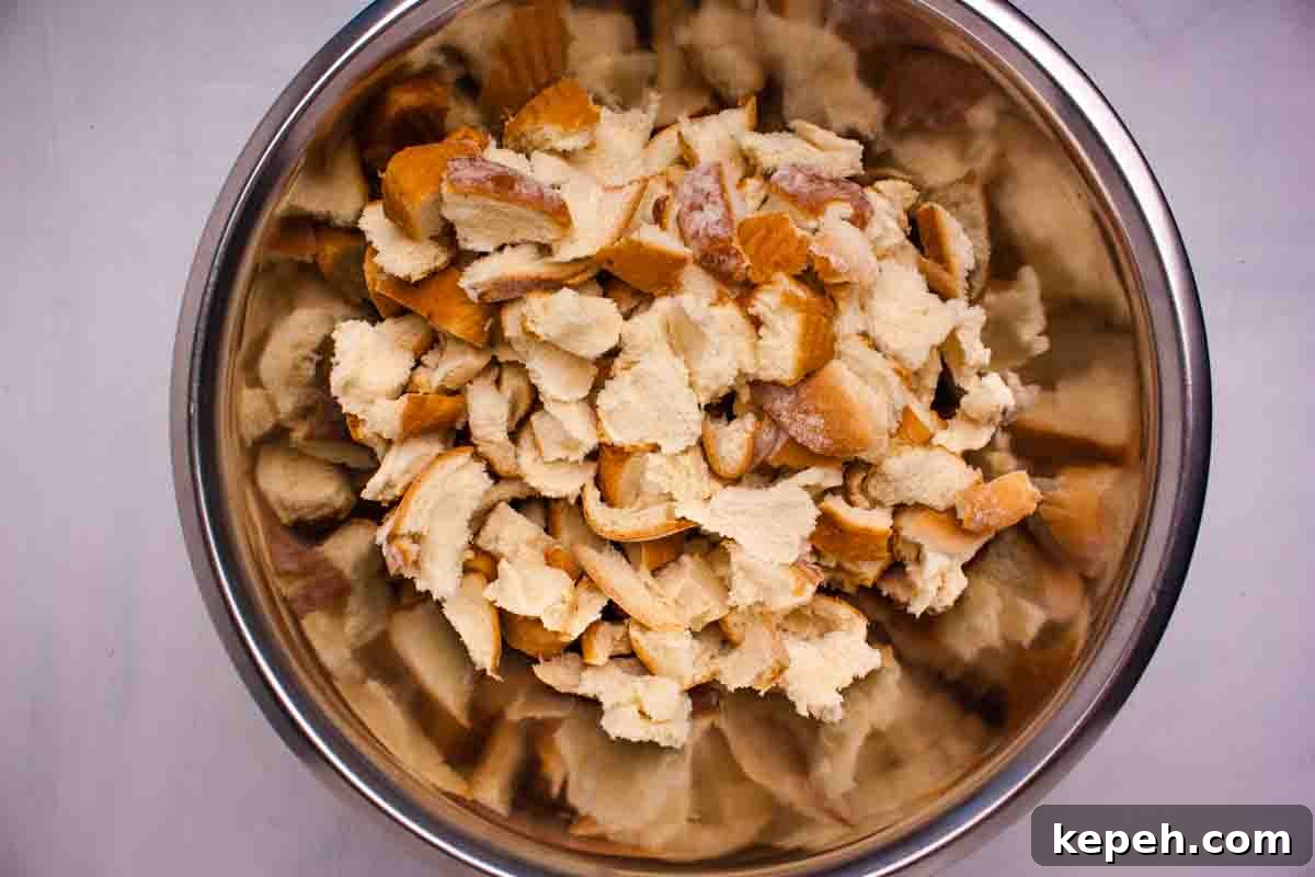 Bacon and Cranberry Stuffing Recipe for Holiday Tables 6 Bread cubes in a large bowl.