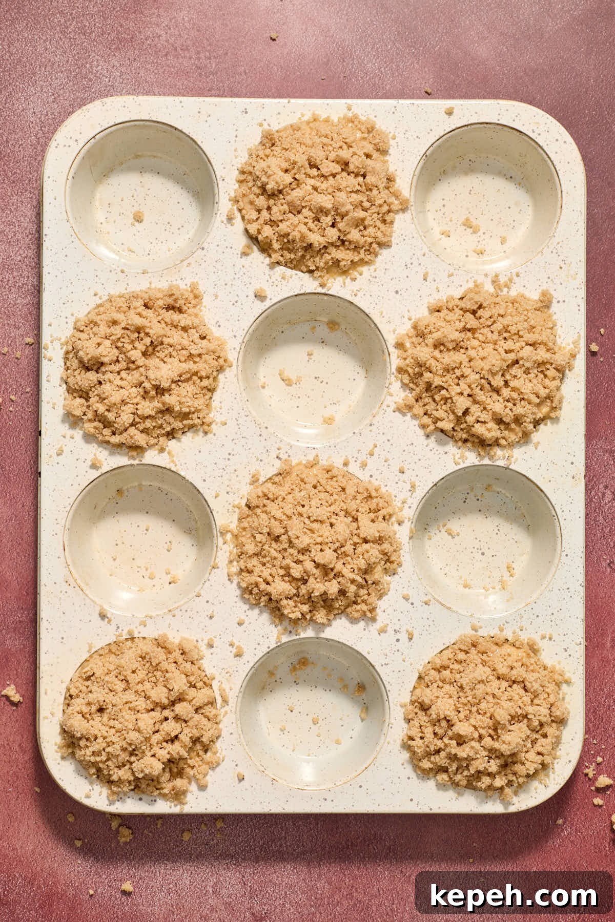 Spiced Eggnog Muffins with Streusel and Eggnog Glaze Recipe 11 Streusel topping added to the muffins before baking.