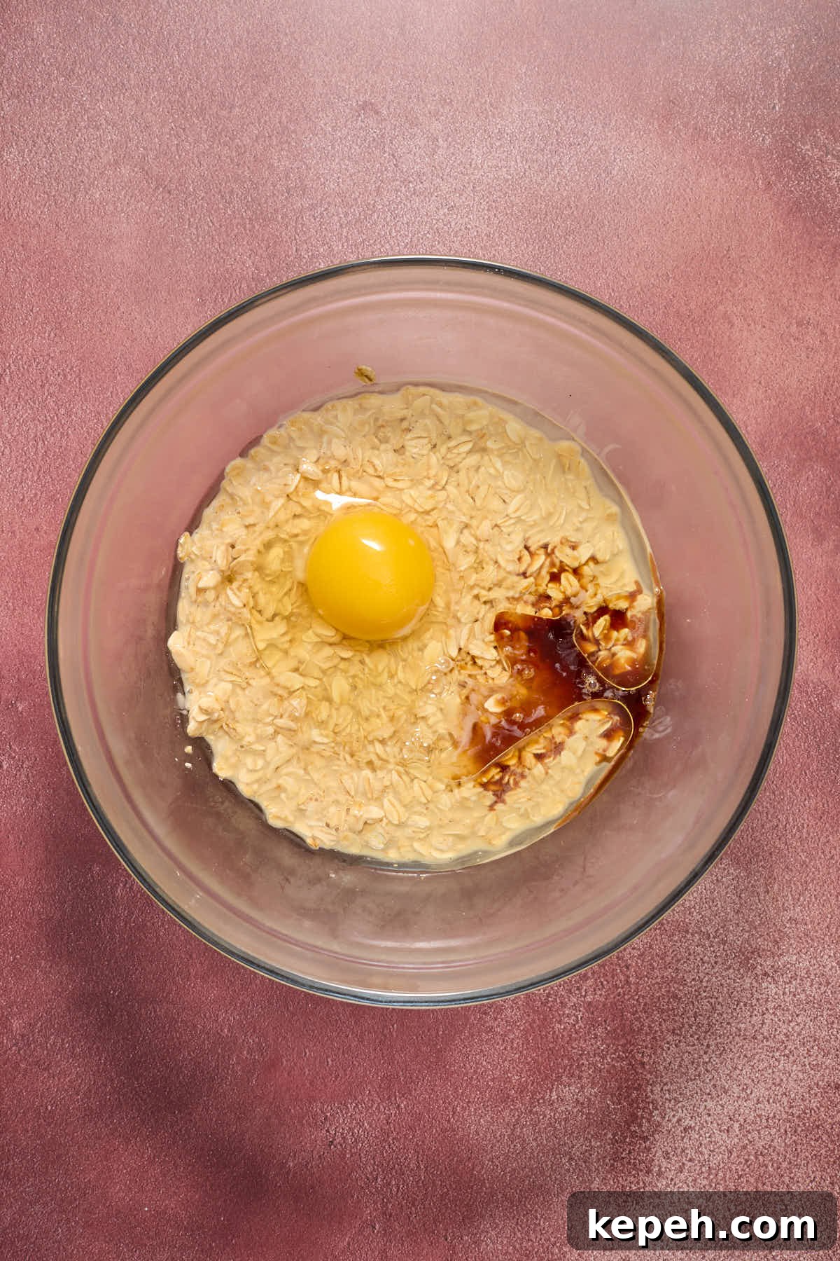 Spiced Eggnog Muffins with Streusel and Eggnog Glaze Recipe 6 Eggs, oil, vanilla and sugar added to the oat/eggnog mixture in a glass bowl.