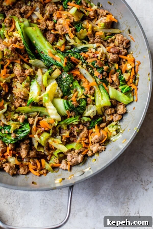 Sticky Teriyaki Pork Meatballs with Ginger and Sesame 9 stir fry with pork and vegetables in a skillet