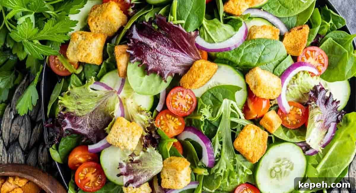 Overhead image of mixed green salad.