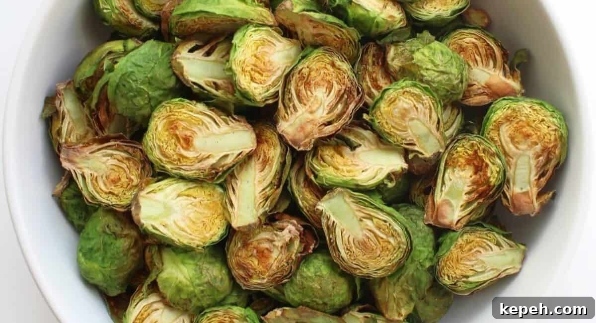 Overhead image of air fryer brussels sprouts.