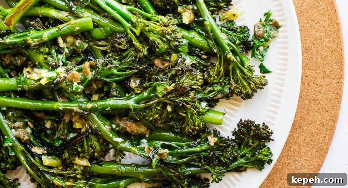 Up close image of charred broccolini with preserved lemon.